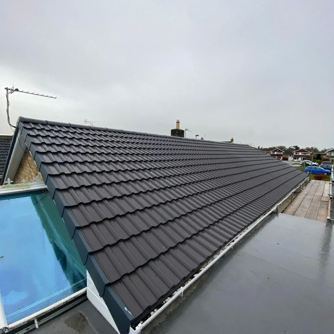 New dark tiled pitched roof installation completed by ABL Roofing Solutions